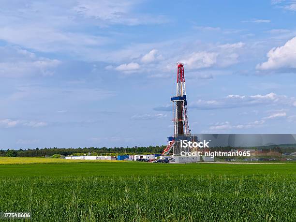 Shale Gas Pipeline Over A Field Of Green Stock Photo - Download Image Now - Shale Gas, Offshore Platform, Crude Oil