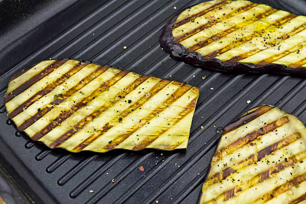 istock sliced ​​eggplant fried in a pan grill 177549188