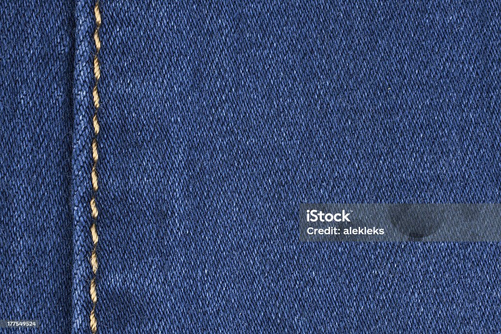 Yellow seam on denim "Yellow seam on denim, background, texture" Abstract Stock Photo