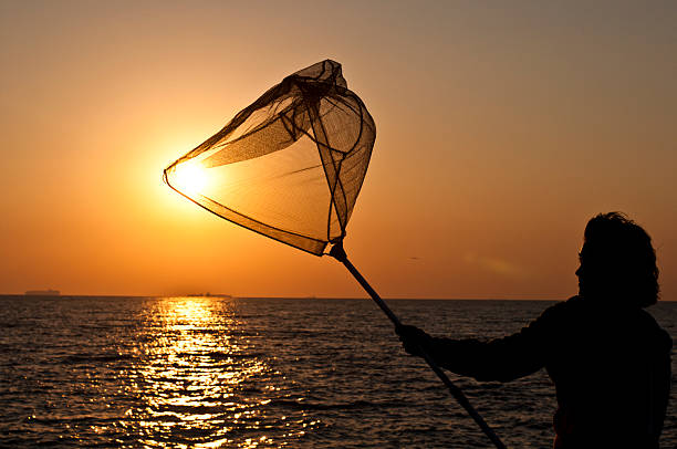 istock woman catches the sun 177550011