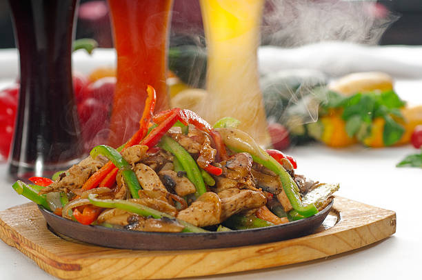istock original fajita sizzling hot  on iron plate 177550018