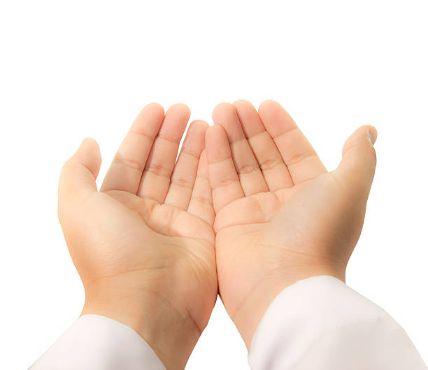 hands raised up for praying stock photo