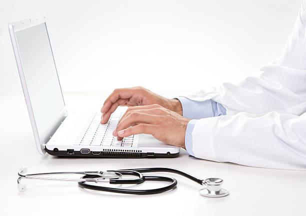 istock Male doctor working on a laptop 177550835