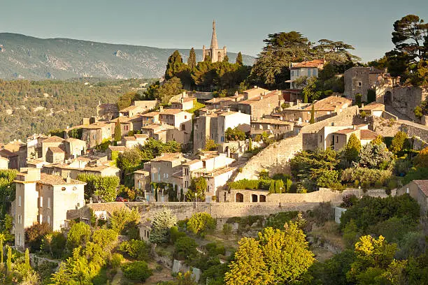 Sunrise over the hill top village of Bonnieux in Provence