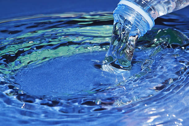 istock Stream of water flowing from the bottle. 177551970