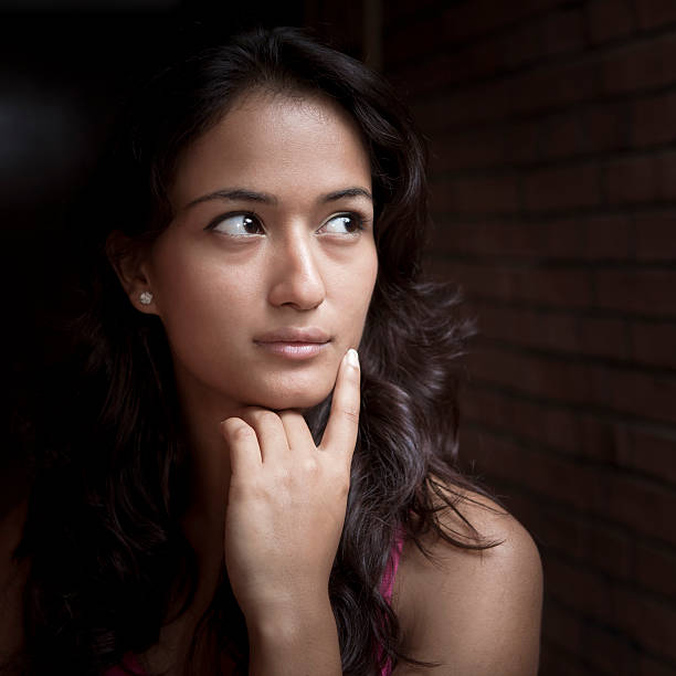 istock Confident, beautiful, young Asian woman looking sideways 177553009