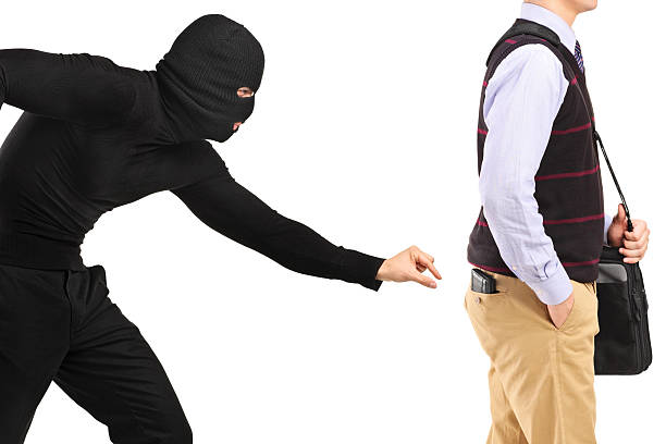 Pickpocket trying to steal a wallet "Pickpocket trying to steal a wallet from a man, isolated on white" pickpocketing stock pictures, royalty-free photos & images