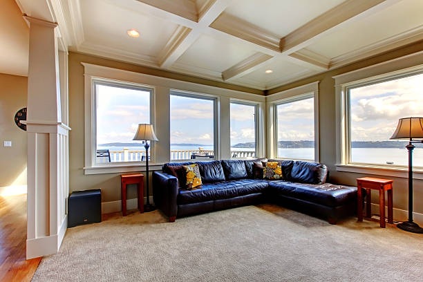 istock Living room wih many large windows and blue sofa. 177554778