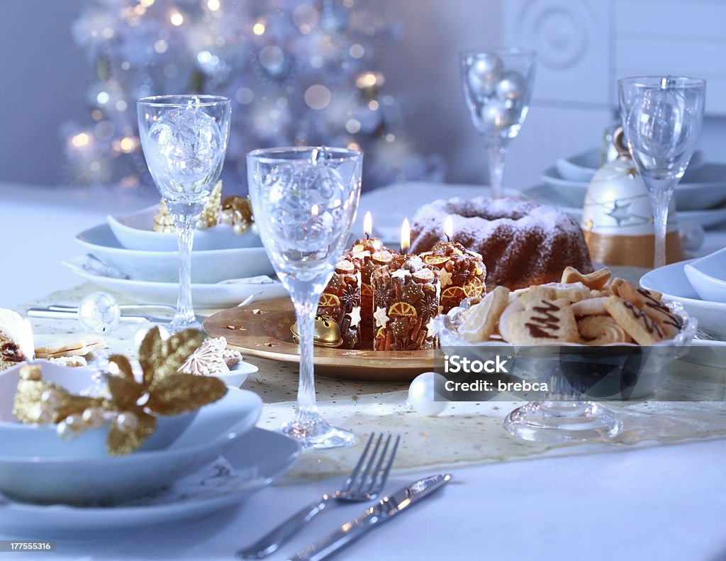 Luxury place setting for Christmas Place setting for Christmas in blue and white tone Christmas Stock Photo