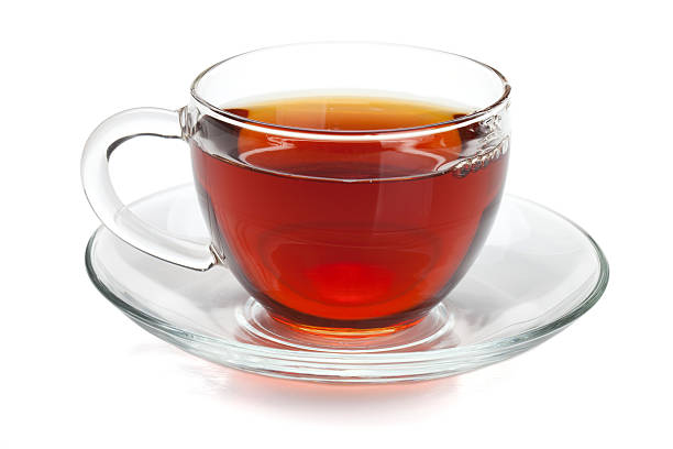 czarna herbata w puchar szklany - podstawka zdjęcia i obrazy z banku zdjęć