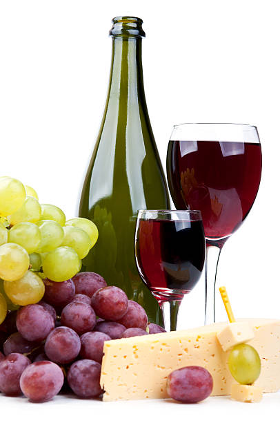 istock bottle of red wine and grapes 177555597