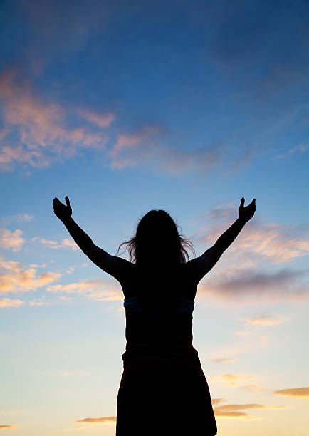 istock Woman staying with raised hands 177555917