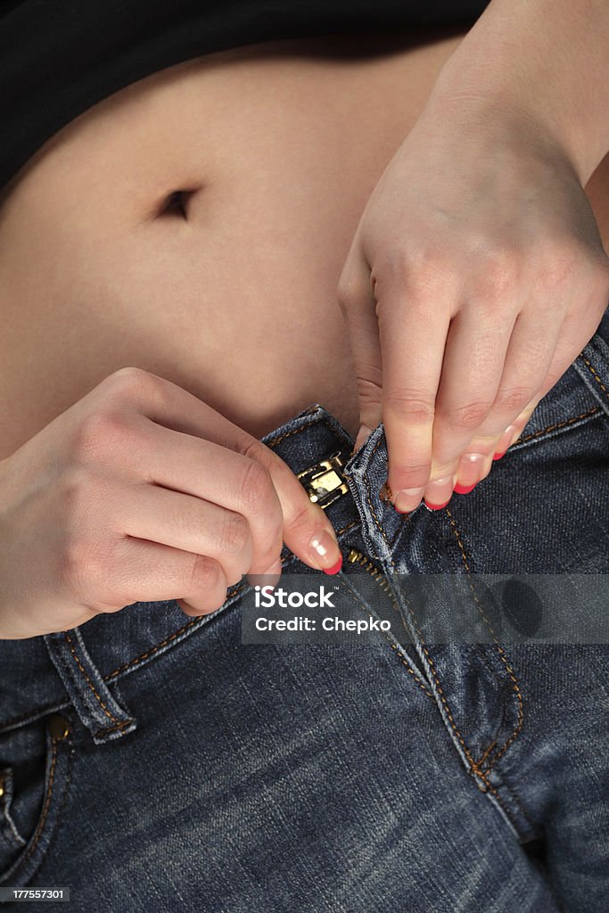 These jeans don't fit anymore! Abdomen Stock Photo