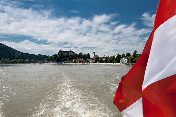 Grein, Danube, Austrian flag "Grein, Danube, Austrian flag" grein austria stock pictures, royalty-free photos & images
