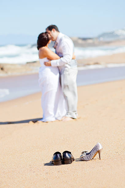 istock groom kissing bride 177558447
