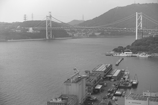 Architectural connections, roads and bridges. Wonderful Aerial view of Bay Bridge on a sunny day. San Francisco Bay, California, USA.