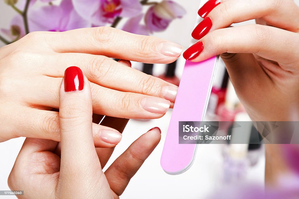 Gentle care of nails in a beauty salon Adult Stock Photo