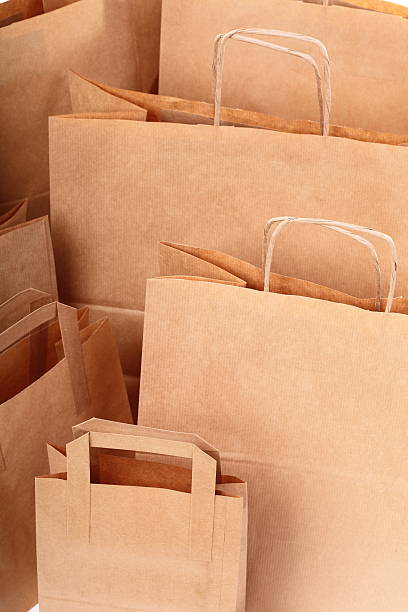 istock Shopping brown gift bags background 177560609