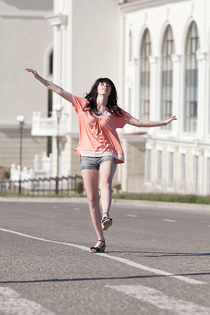 istock Brunette in shorts on open air 177560909
