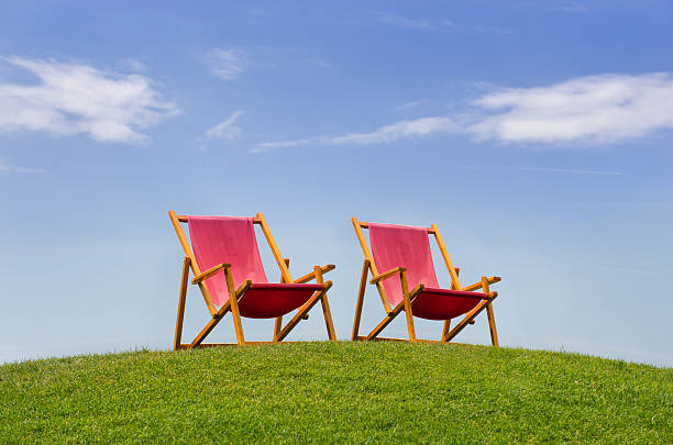 two deckchairs stock photo