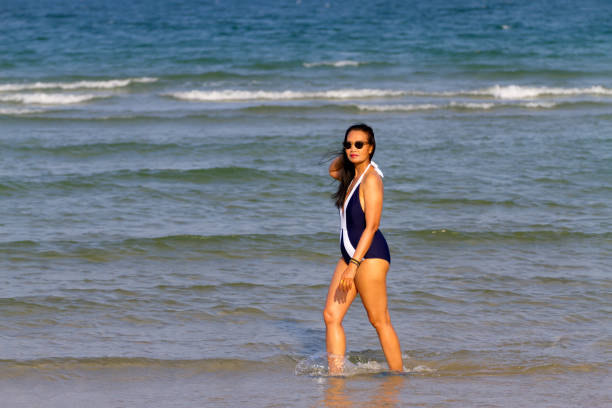 istock Woman body beautiful relax on beach 1775637814