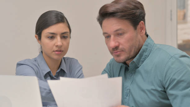 istock Close Up of Multi Ethnic People Discussing Project 1775678712