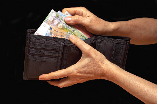 Black wallet with money stock photo