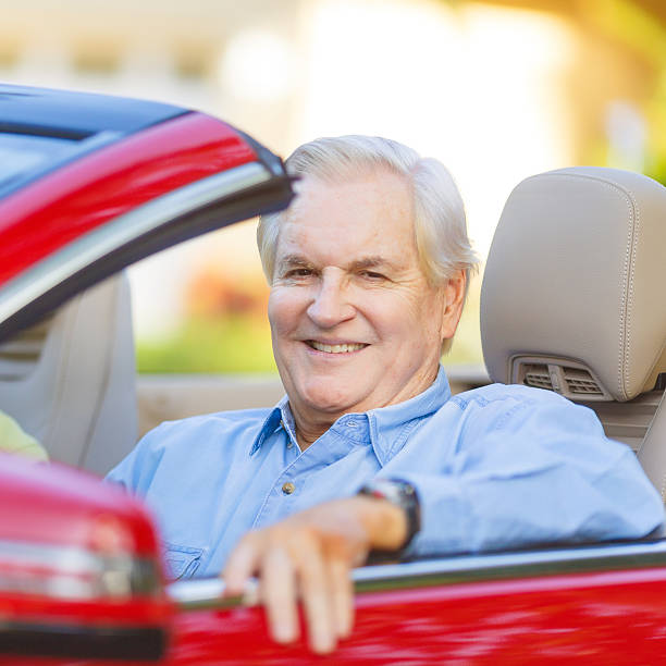istock senior man in a car 177569636