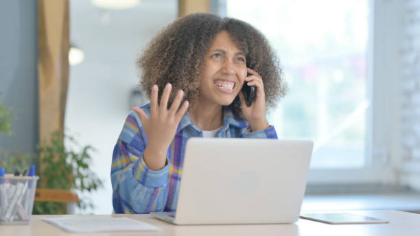 istock Upset Young African Woman Arguing on Phone Talk 1775709558