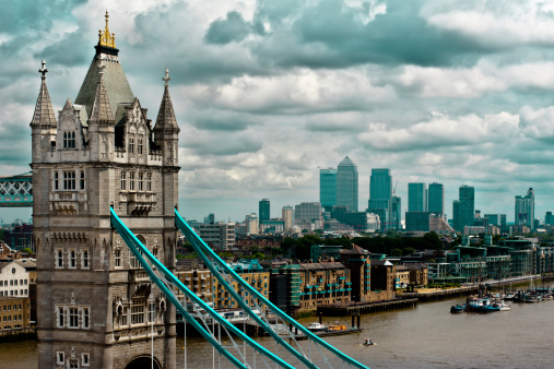 Unique elevated view of London Bridge with Canary Wharf on the background