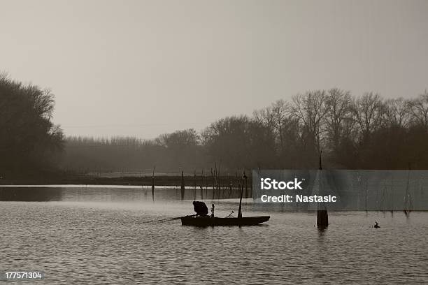 Fishing At Sunset Stock Photo - Download Image Now - Aquatic Sport, Black Color, Dusk