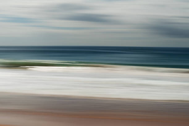 istock Blurred waves crashing on the beach 1775720634
