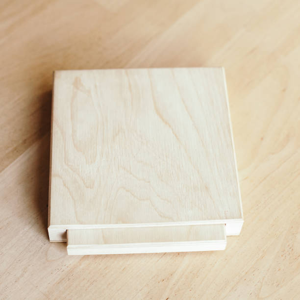 wooden box for storing small items, plywood box with a pull-out compartment, space for text, eco-friendly material, the box is on the table
