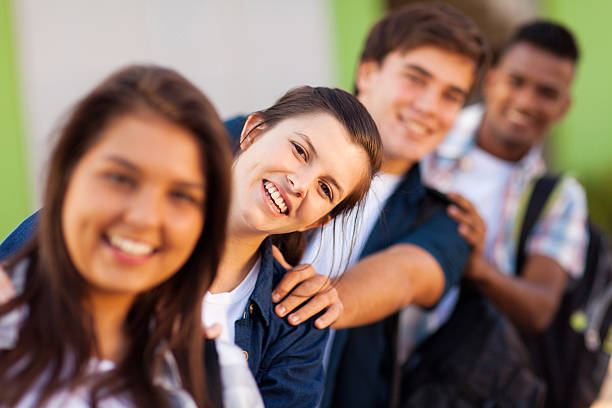 istock group of playful high school students 177574076