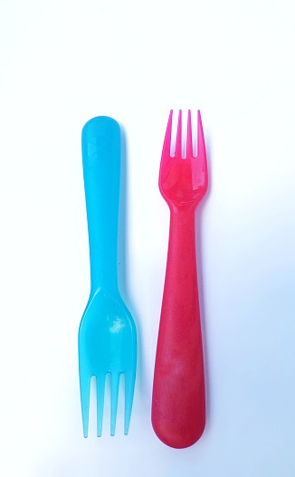 Plastic forks in blue and red colour for kids usage