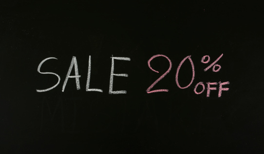 sale 20% off drawing on blackboard