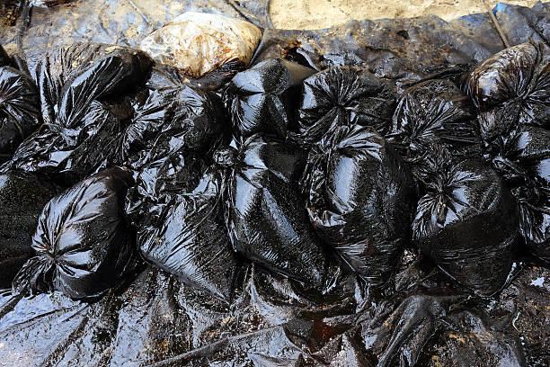istock Water pollution - old garbage and oil 177580292