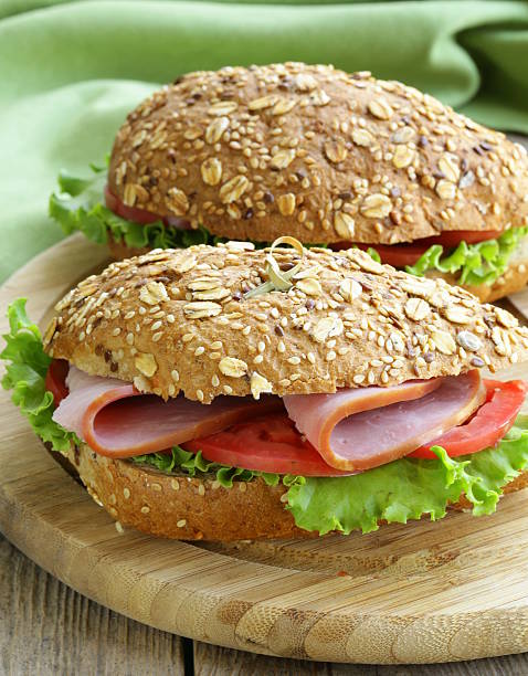 istock sandwich of wholemeal bread with ham and tomatoes 177580318