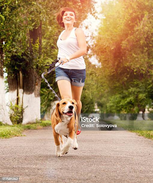 Active Walk With Pet Stock Photo - Download Image Now - Dog, Walking, Women