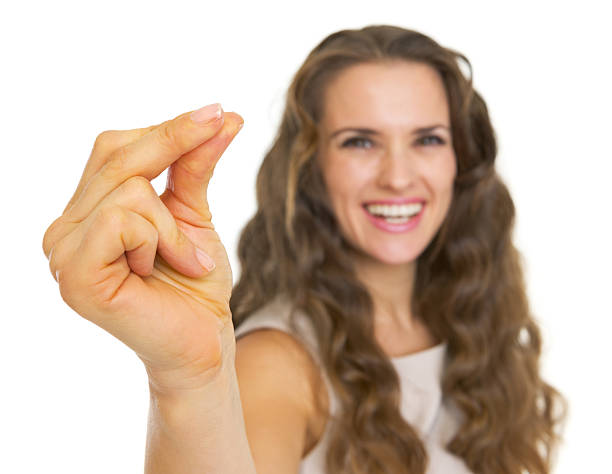 istock Closeup on smiling young woman snapping fingers 177584044
