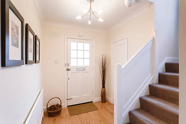 istock Interior of a white mudroom and carpeted stairs 177584450