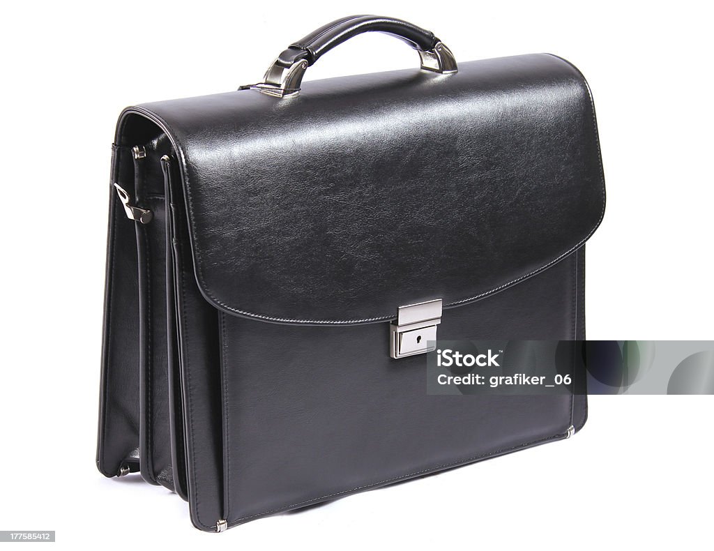 Business briefcase on black Black leather briefcases. Handheld is locked black leather case. Bag Stock Photo