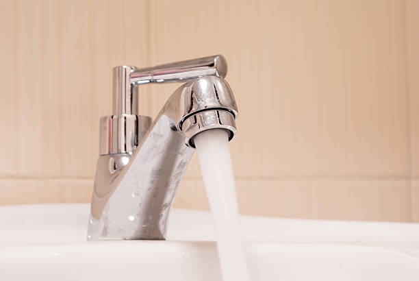 istock pure water running down from the faucet 177587041