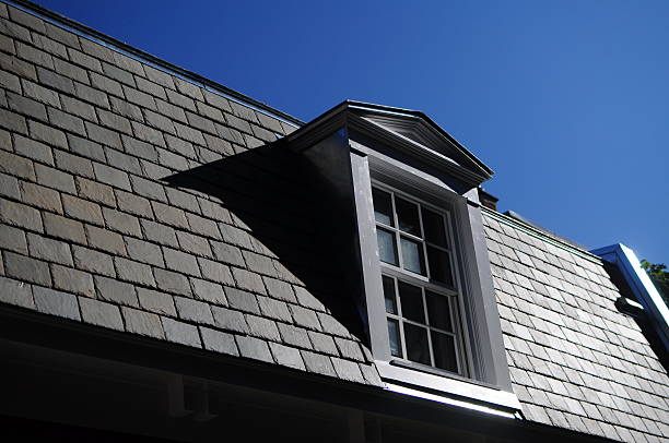 istock Grey clay roof with white painted window Montreal Quebec Canada 177587468