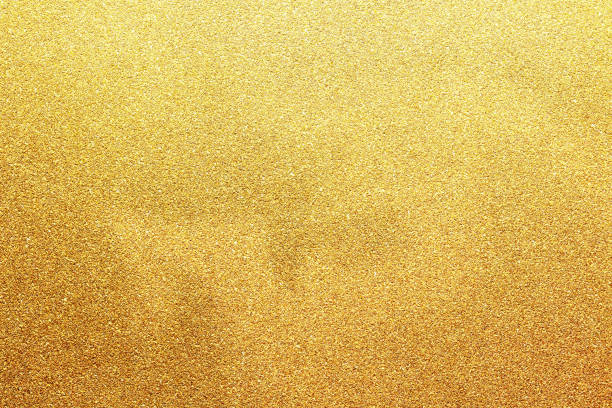 istock gold glitter paper abstract, natural grunge texture background, retro styled concept 1775874725