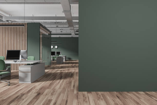 istock Green and wooden open space office with blank wall 1775895918
