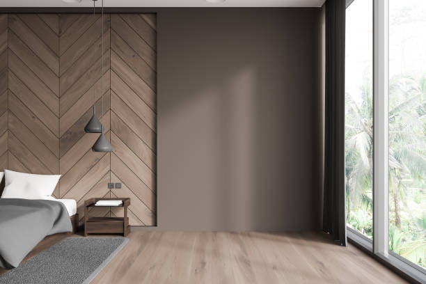 istock Brown and wooden bedroom interior with blank wall 1775902397