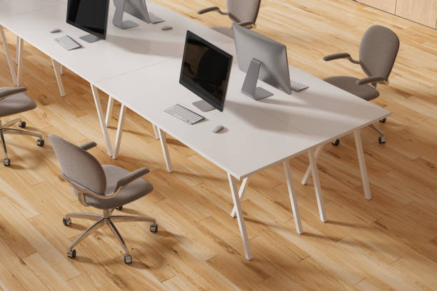 istock Top view of business office interior with pc computers and armchairs 1775902921