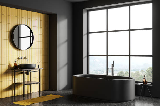 istock Home bathroom interior with tub and sink with accessories, panoramic window 1775903561