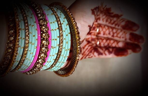 Close-up of  Hena Hand With colorfull bangles stock photo